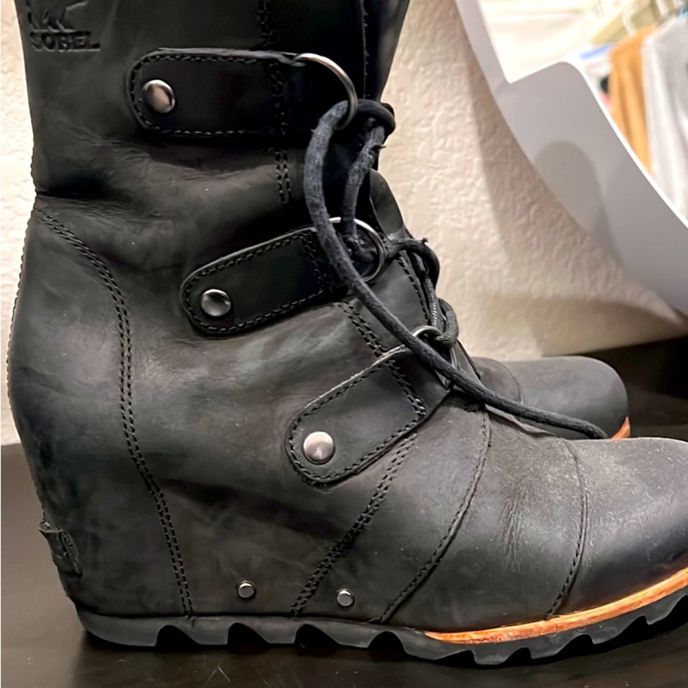 Sorel Joan of Arctic black boots.